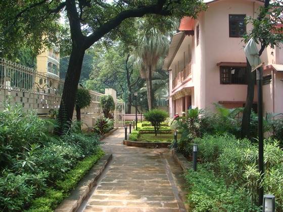 A picture of the path leading to the Holy Mother's Temple, situated on the first floor of a building within the Ramakrishna Mission and Math complex in Mumbai.